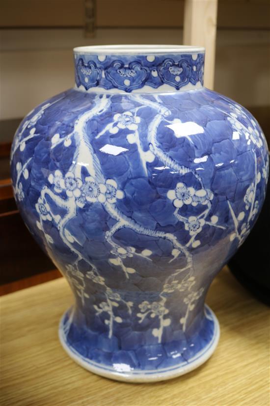 A 19th century Chinese large blue and white baluster vase decorated with prunus